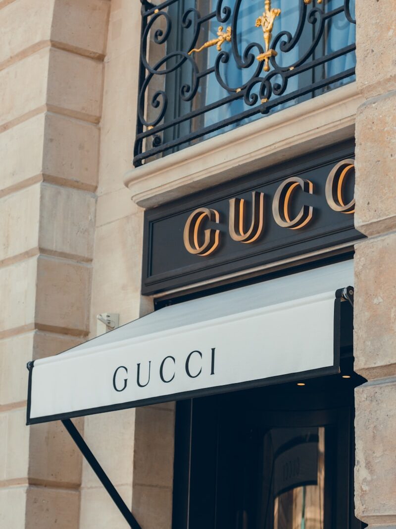 a building with a sign that says gucci
